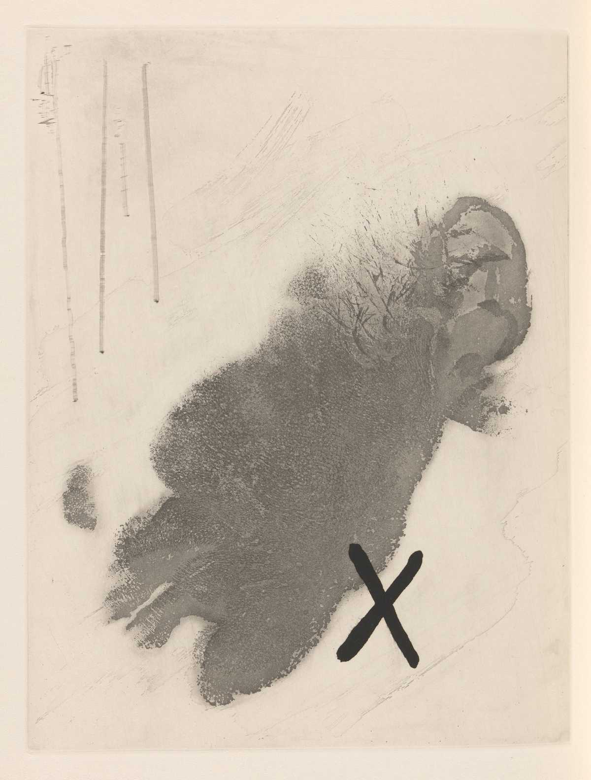 A print of a dark shape with an 'X'.